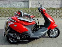 Трехколесный скутер Handiscoot для инвалидов